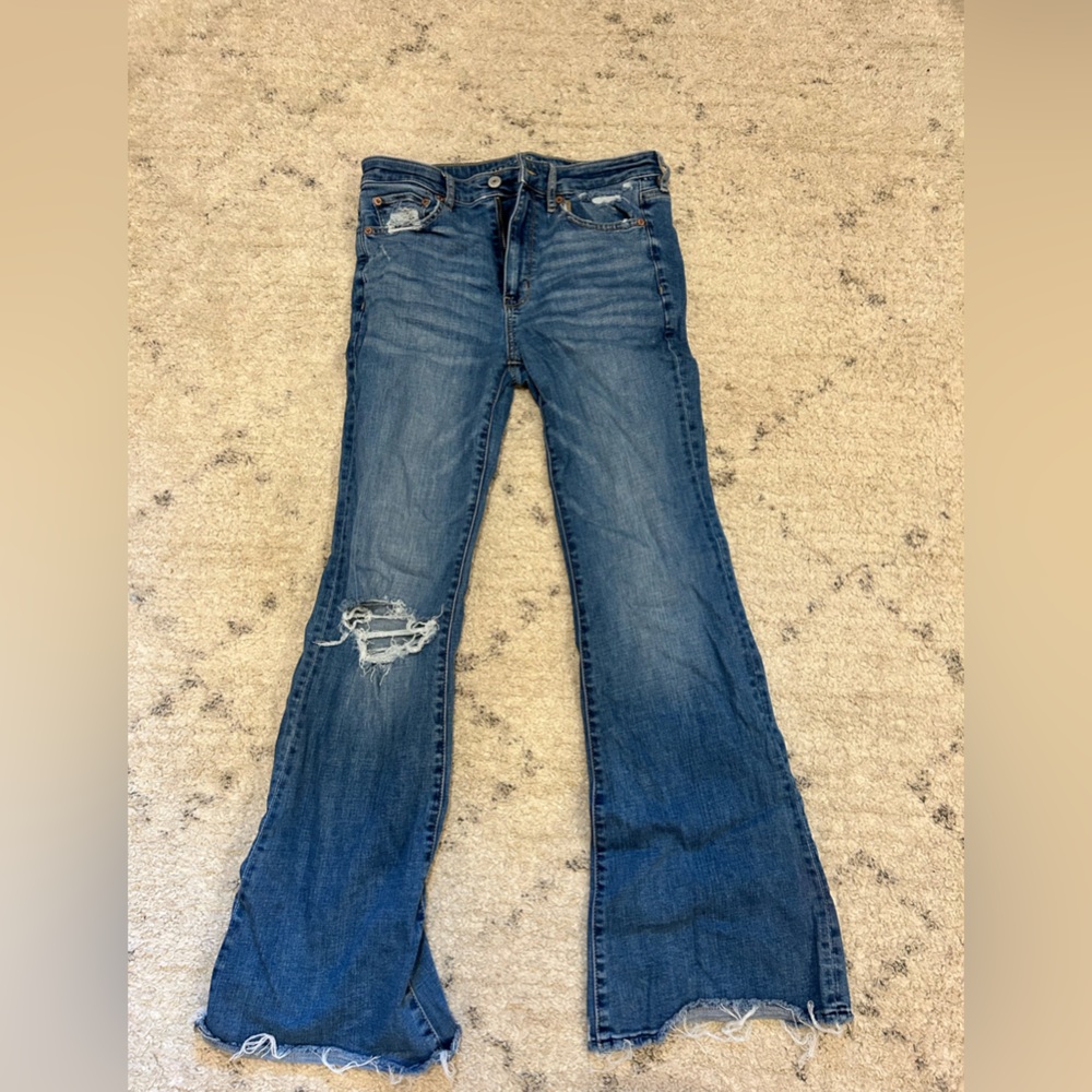 American eagle ripped flare jeans